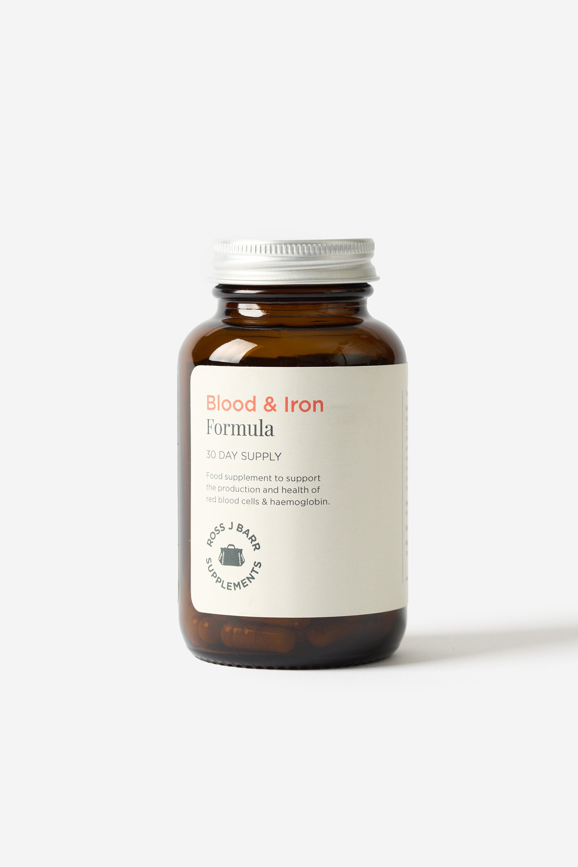 Les suppléments Blood & Iron Formula de Ross J Barr dans une bouteille en vitre sur un fond blanc.