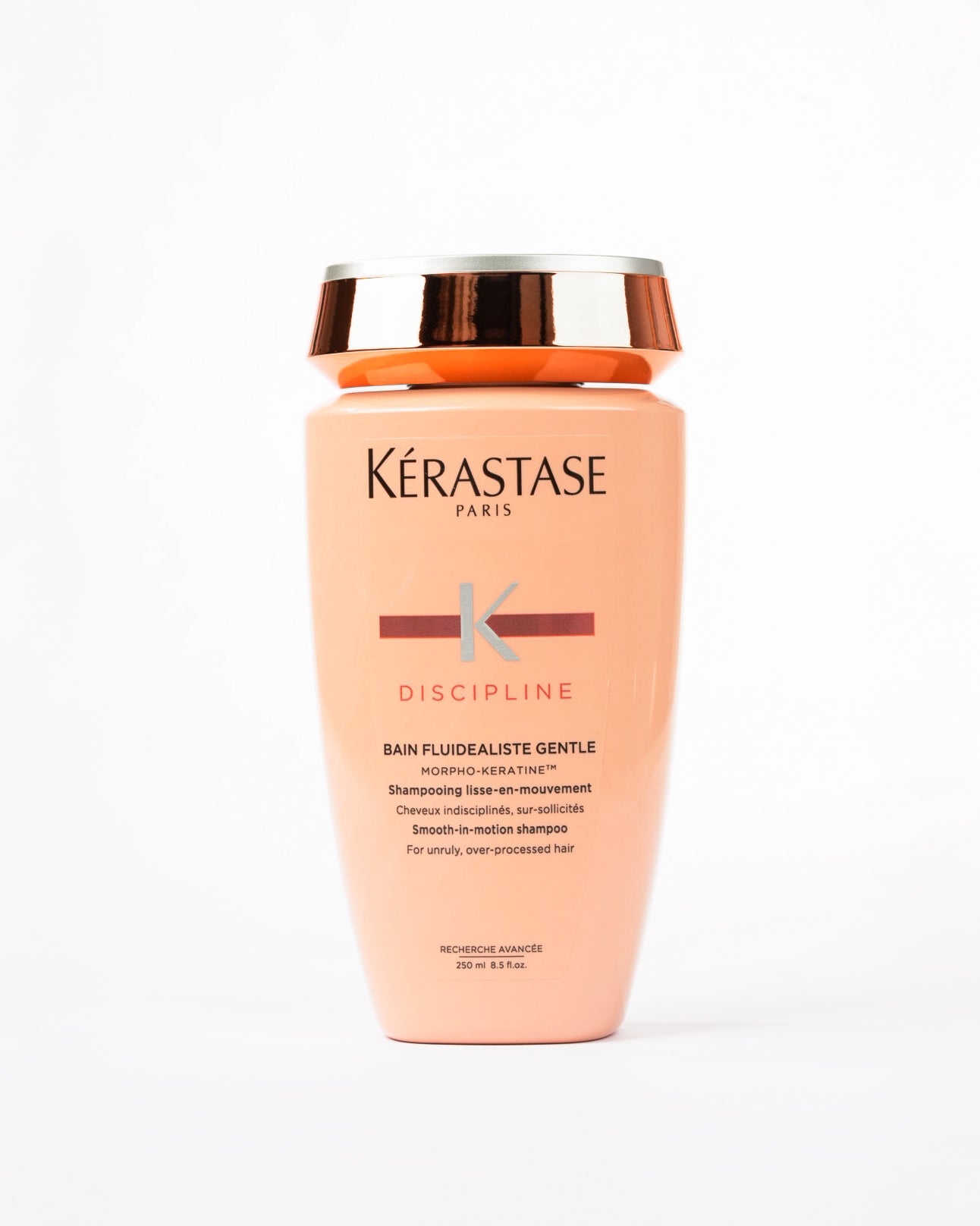 Bouteille orange claire du shampooing bain fluidealiste gentle de Kérastase 
